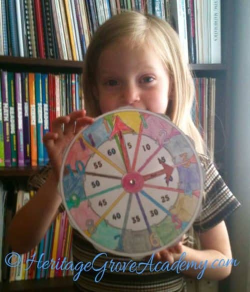 Learning to tell time in homeschool - counting by fives math pages!